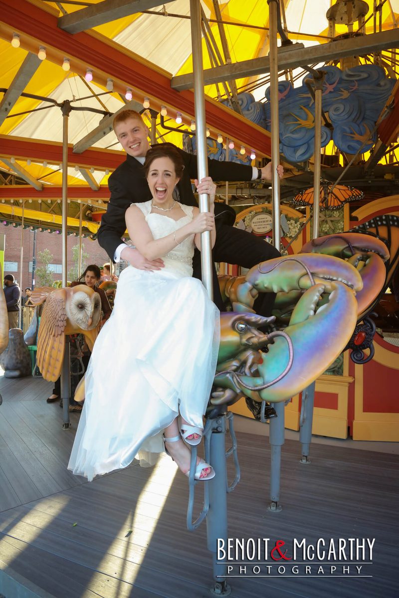 Bride & Groom On Carousel by Marriott Long Wharf
