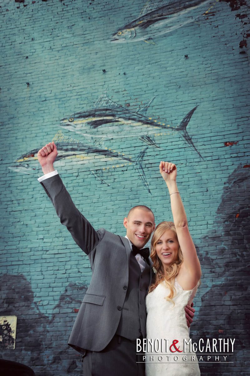 Bride & Groom having fun with Fish Mural  at Portsmouth Harbor Events